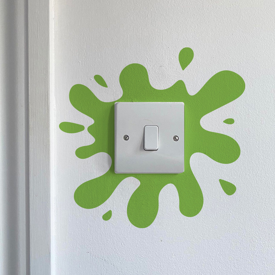 Paint Splat Light Switch in Lime green on a white wall
