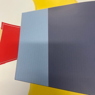 red, blue, and yellow on a white rocket