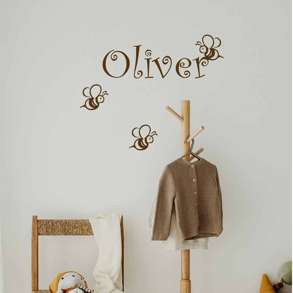 Custom baby name decal with bee design on wall