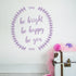 Be Bright, Be Happy, Be You Wall Sticker. Shown in purple on a white wall. Perfect for a children&