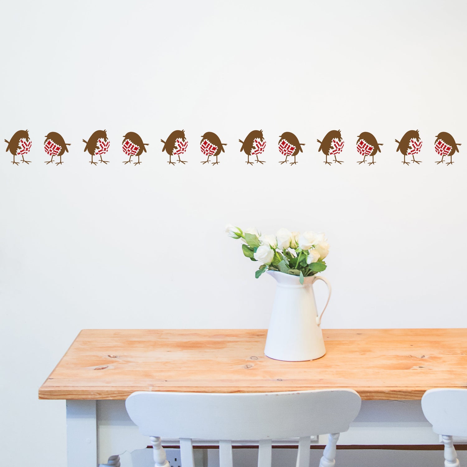 Christmas Stencils on a dining room wall.