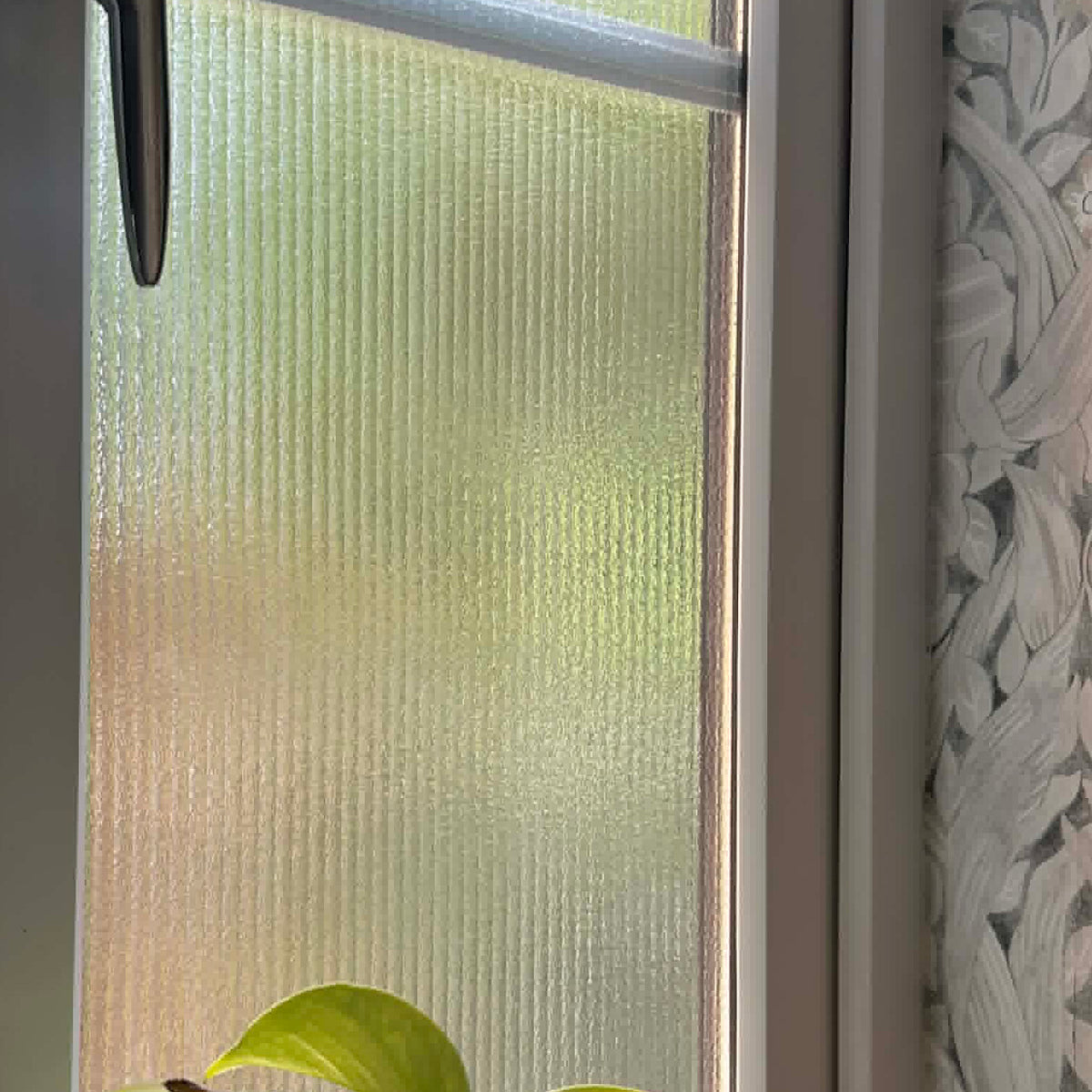 Bathroom glass panel with Reeded Window Film and leaf detail