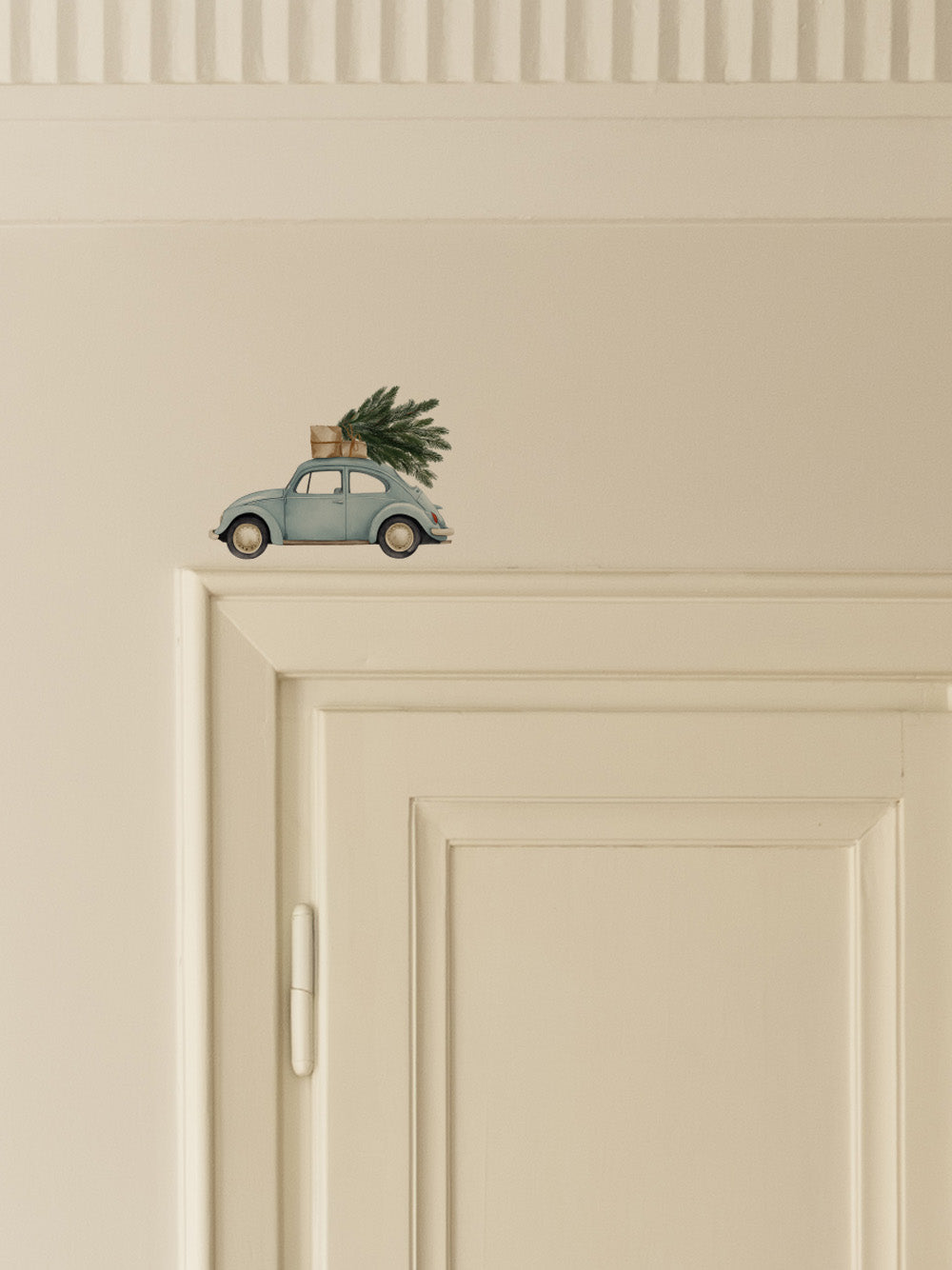 Blue Car Carrying a Christmas Tree Door Decoration