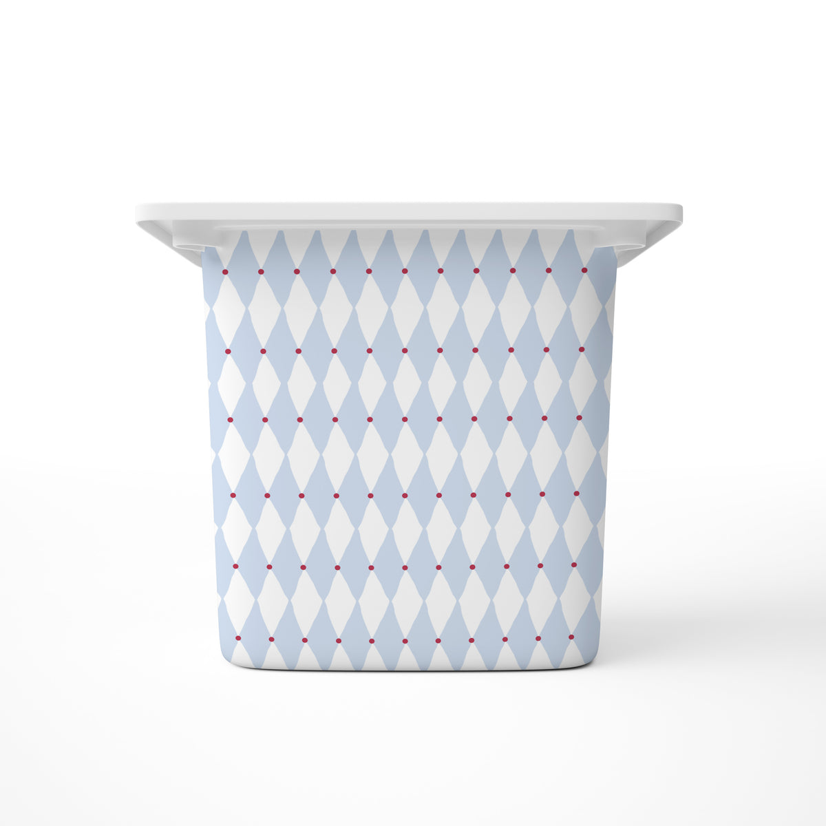 A large rectangular storage bin, featuring a light blue and white harlequin diamond pattern with small red dots, shown on a clean white background.