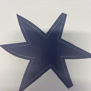 Blue star-shaped object on a white background