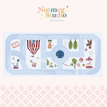 Circus Play Sticker with roads, circus themed animals, circus tent, merry go round and trees on a pink background