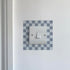 Dark & Light Blue Chequred_Light_Switch_Decals on a white wall