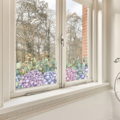 Bathroom window with Hydrangea Window Sticker and trees in the background
