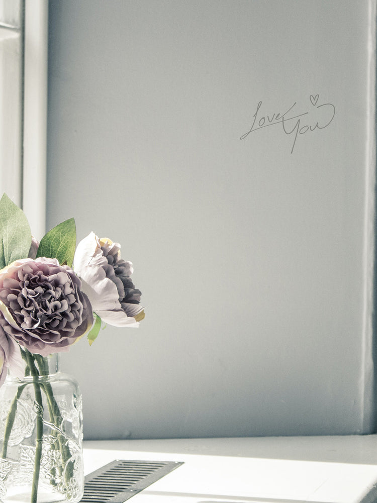 Floral arrangement in a vase with &