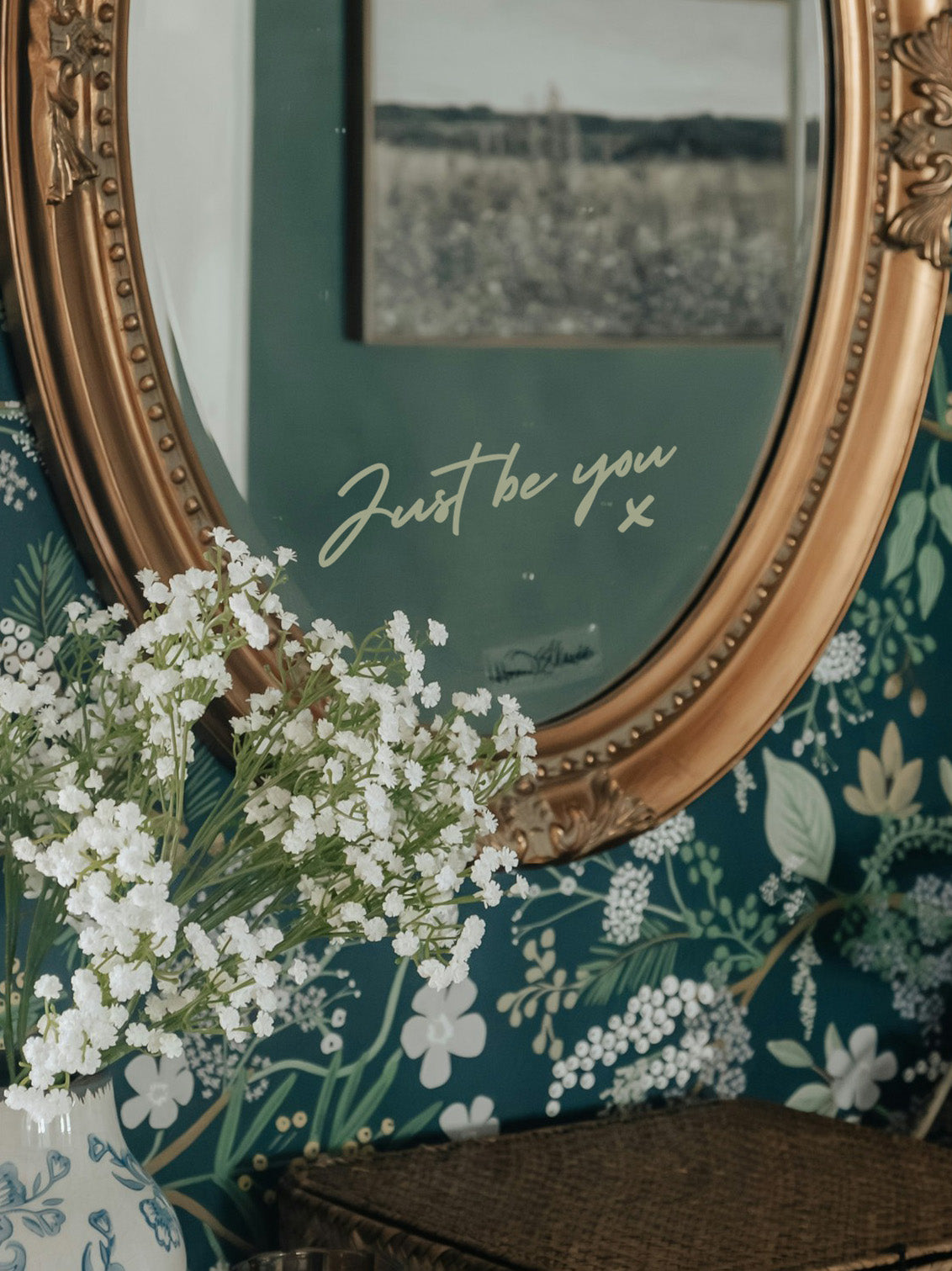 Decorative mirror with floral wreath and &