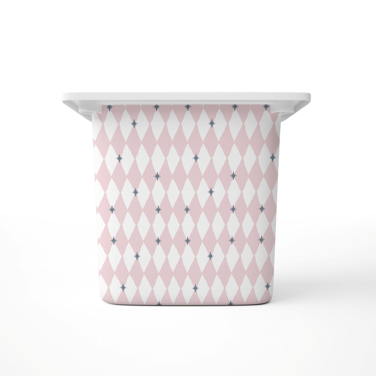 A Large rectangular storage bin, featuring a pink and white harlequin diamond pattern with small blue star accents, shown on a clean white background.