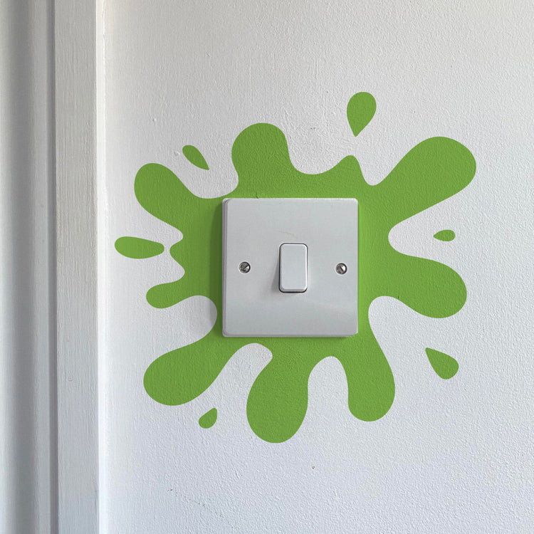 Paint Splat Light Switch in Lime green on a white wall