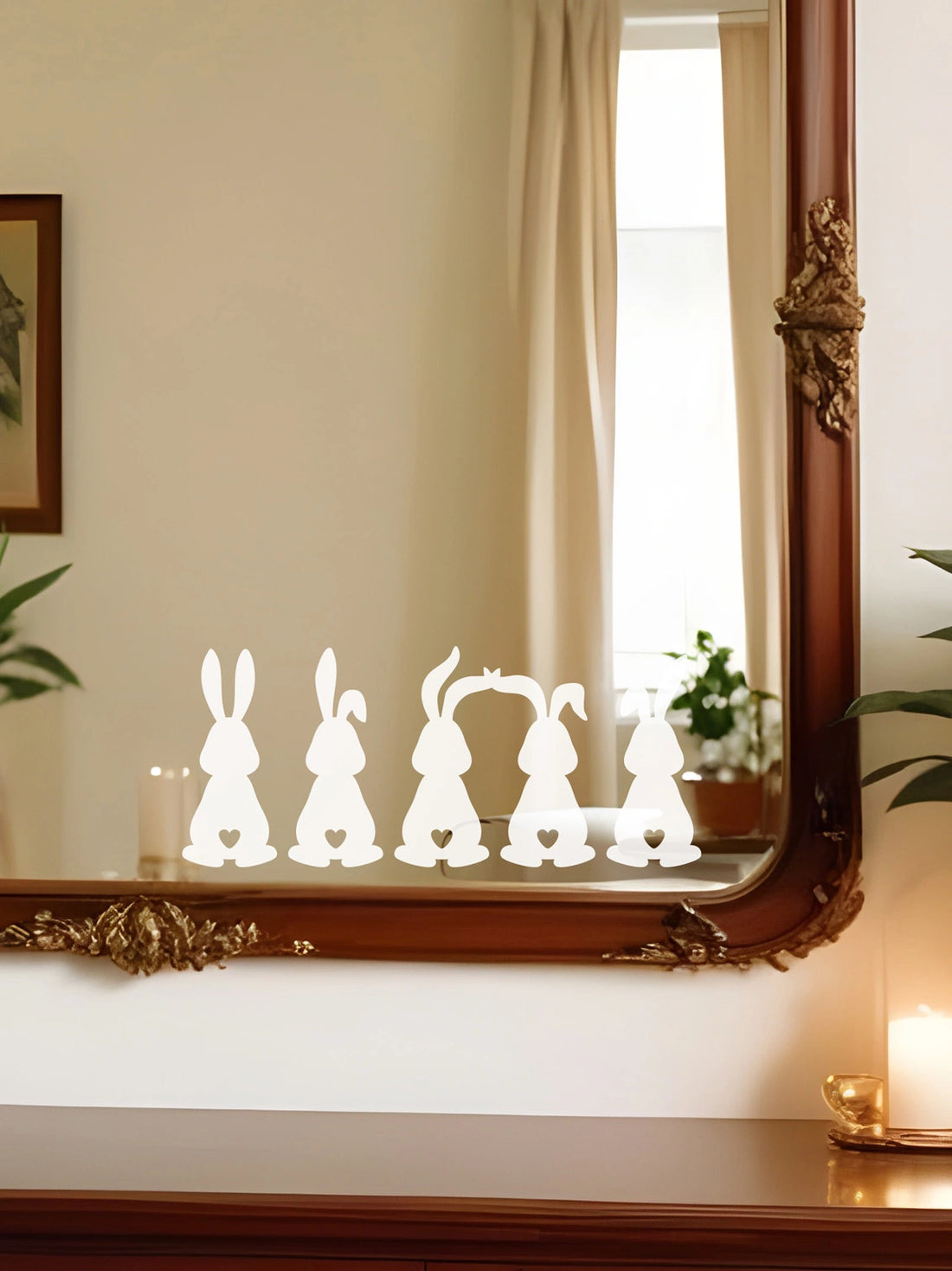 Set of 5 Easter Bunny Mirror Stickers on a brown mirror above a sideboard with a candle