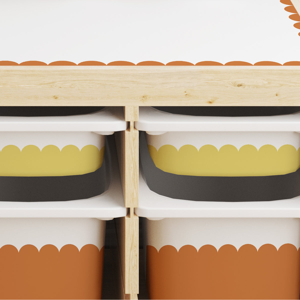 Close-up of a wooden storage organizer with four white bins featuring yellow stone and rumba orange scalloped patterns, set against a white background.