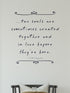 Famous quote by F. Scott Fitzgerald on a light gray background with a chair in the foreground.