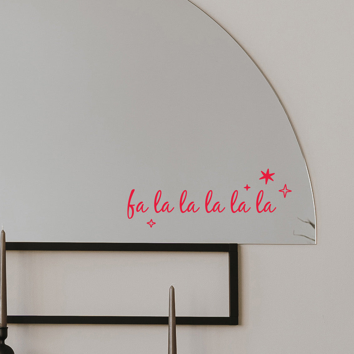 A pink vinyl wall decal spelling &