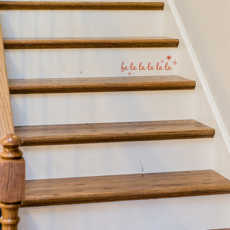 Wooden stair treads with a red &