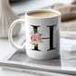 White mug with floral letter &