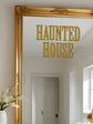 Gold-framed mirror with &