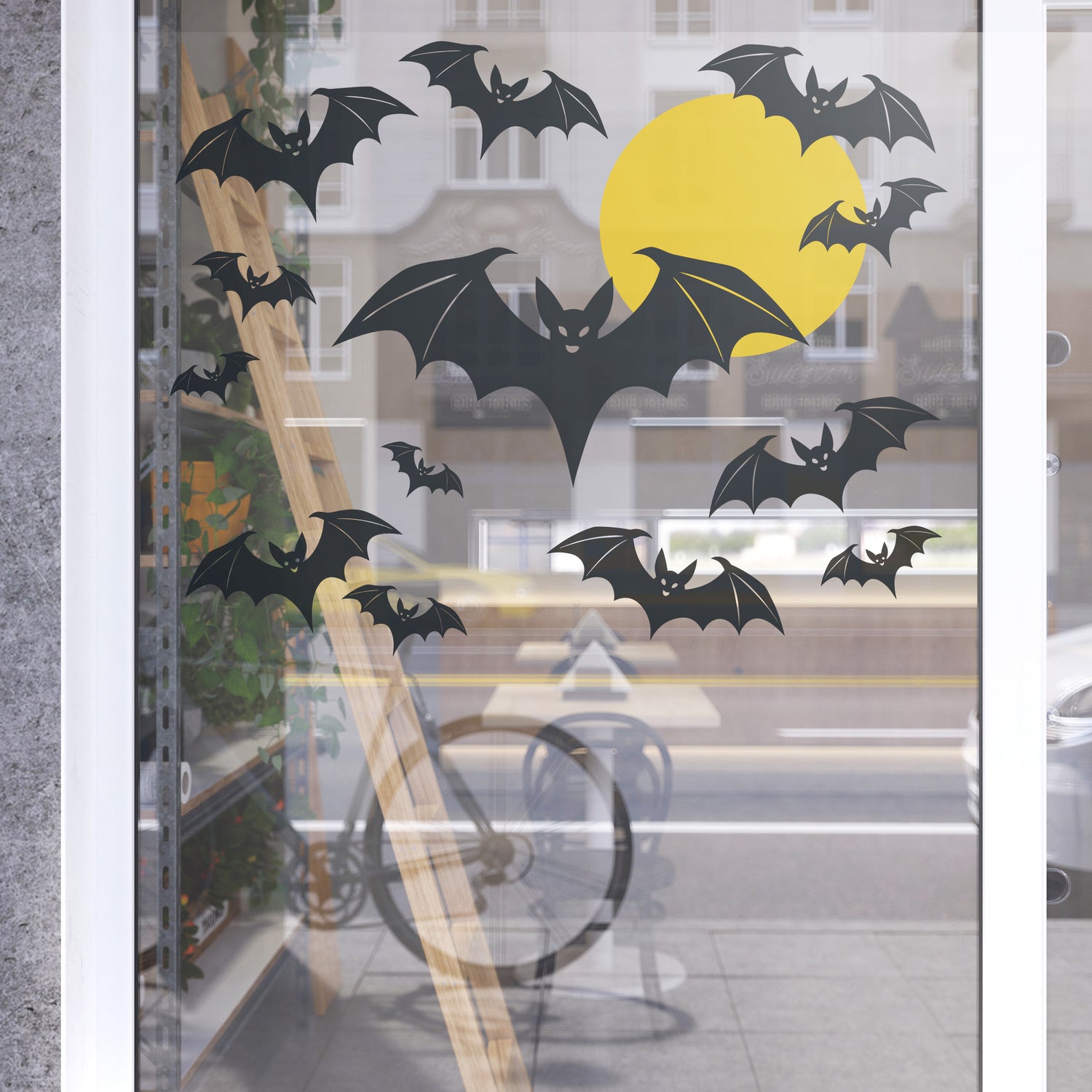 Spooky Halloween night window decal with bat and moon
