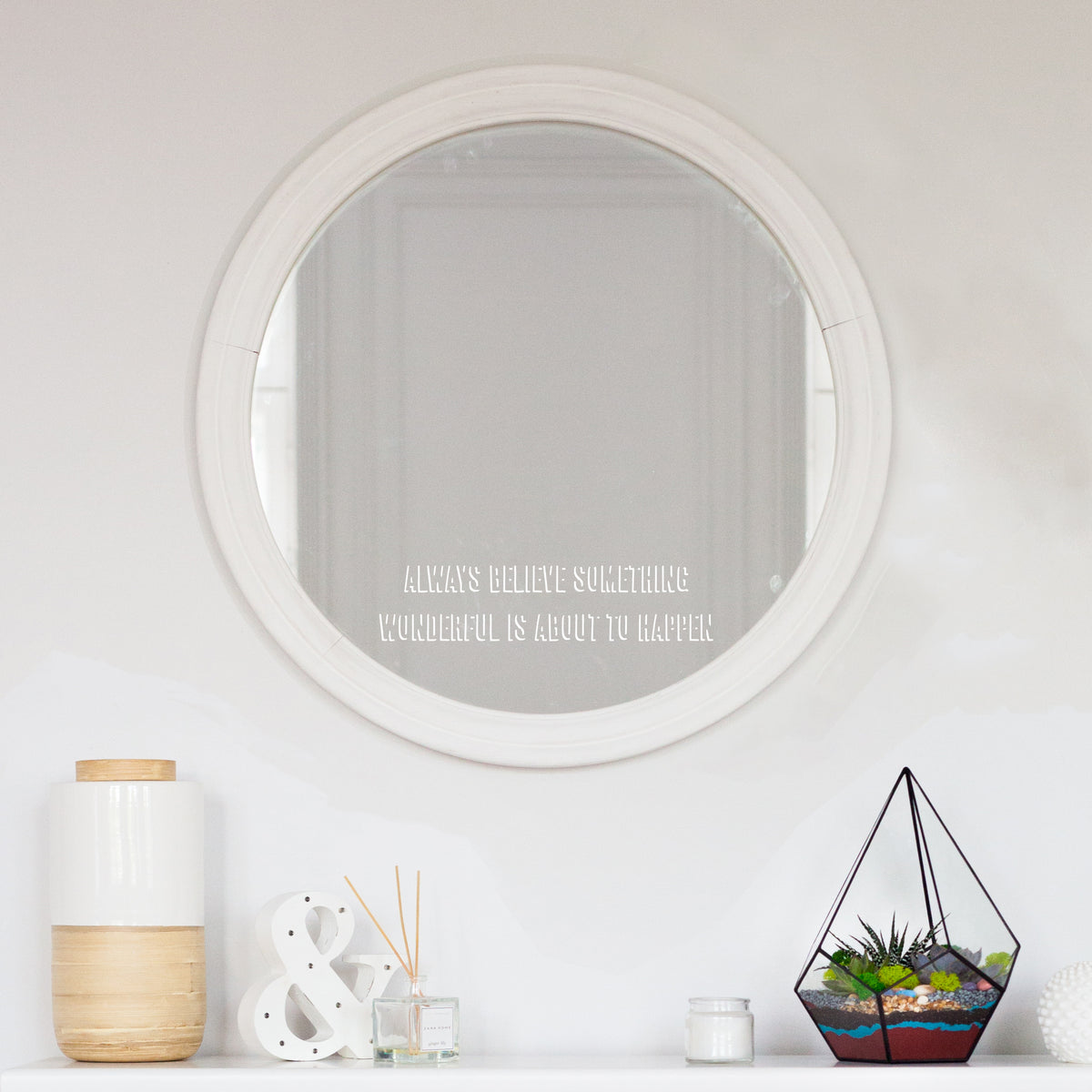 Always Believe Something Wonderful Is About To Happen mirror sticker. A white vinyl shown on a mirror in a shadow style font