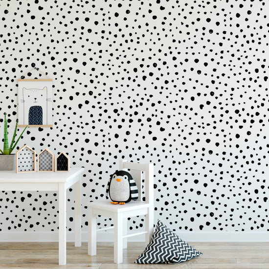 Black Dalmatian Dots Self-Adhesive Wallpaper.  A white background wallpaper with black dots that can be used in any room. 