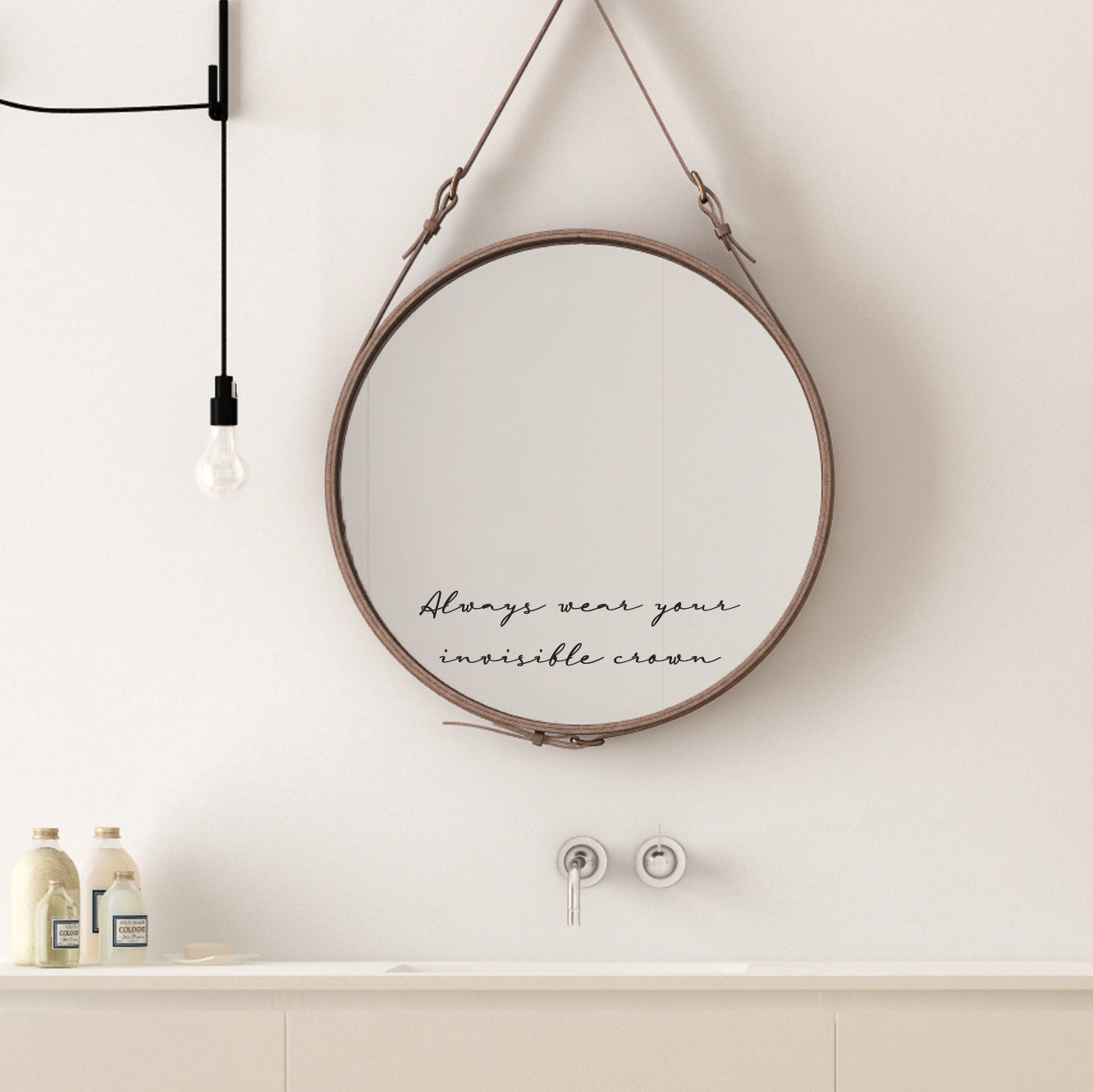 Always Wear Your invisible Crown mirror sticker. A black vinyl shown on a mirror in a script style font. A decoration for a bathroom or bedroom.