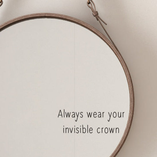 Always Wear Your invisible Crown mirror sticker. A dark grey vinyl shown on a mirror in a handwritten style font. A decoration for a bathroom or bedroom.