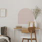 Arch Colour Block Wall Sticker. In rose coloured vinyl shown on a white wall, for decoration when decorating homes.
