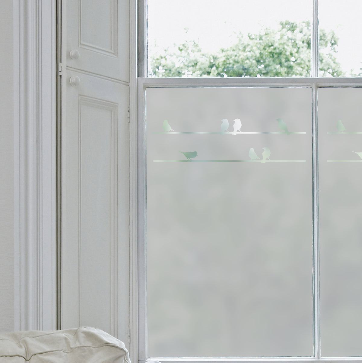 Birds On A Wire Frosted Window Film. Perfect for a frosted window look in any room in a house. Shown as frosted vinyl on a window with the birds on wires. 